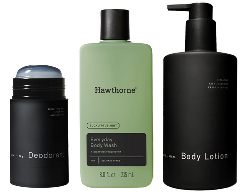 The hawthorne Body Starter Set features three black and green bottles—deodorant, body wash, and body lotion—arranged side by side, perfect for elevating your daily routine.