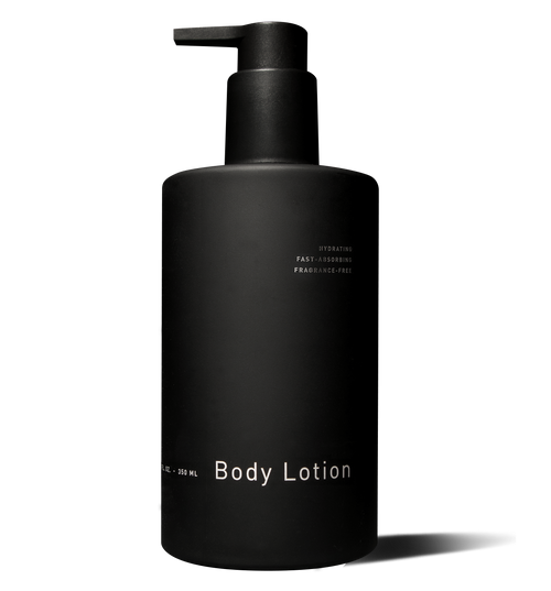 A matte black pump bottle labeled Medium Weight Body Lotion by hawthorne, with white text on a dark background, promises radiant skin with nourishing natural extracts.