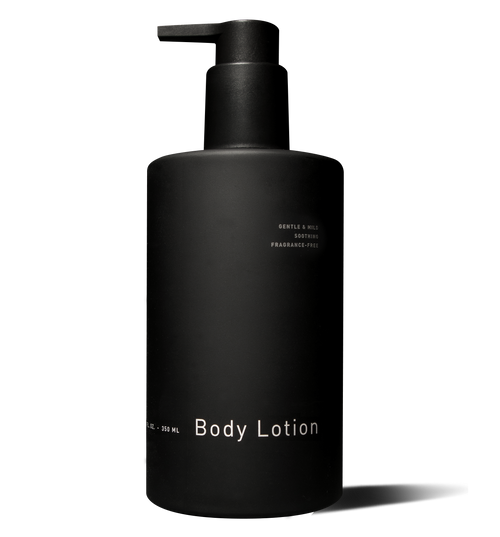 A matte black pump bottle of hawthorne Sensitive Skin Body Lotion—gentle, mild, soothing, and fragrance-free with chamomile extracts for sensitive skin.